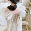 Đầm ren bé gái màu trắng kem tay cánh tiên