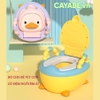 Bô vệ sinh cho bé vịt con CAYABE có tay vịn an toàn và đệm ngồi êm ái màu vàng / hồng
