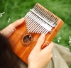 dan-kalimba-17-phim-ka04-go-nguyen-khoi-full-phu-kien-am-thanh-trong-treo