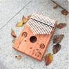 kalimba-17-phim-ka03-go-tu-nhien-dan-thumb-piano-khac-hoa-tiet-full-phu-kien