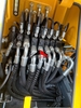 may-xuc-dao-03-banh-lop-hengte-ht80w