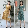 Đầm xòe hoa đính nút tay phồng, có túi - GR0306