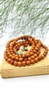 Chuỗi Gỗ Bồ Đề Phật Nhãn Vàng Phụ Kiện_13-14 Ly_108 Hạt