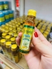 Dầu gió lăn thảo dược gừng nghệ Yellow Oil Green Herb Thái Lan