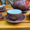 Bộ ấm chén gốm hoa đào chạm nổi