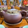 Bộ ấm chén gốm nâu bọc đồng