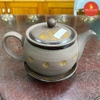 Bộ ấm chén gốm hoa vàng