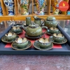Bộ ấm chén hỏa biến số 12 chén lòng hoa