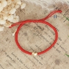 vong-tay-day-do-charm-trai-tim-bac-xi-vang-v2409160016