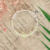 vong-tay-tre-em-charm-hinh-cau-bac-va-cuom-nhua-mau-vang-dan-xen-v2409110017