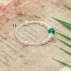 vong-tay-tre-em-charm-cau-bac-va-da-mau-xanh-la-cay-v2409110029
