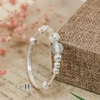 vong-tay-tre-em-charm-cau-bac-va-hat-nhua-mau-trang-duc-v2409110018