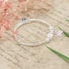 vong-tay-be-gai-thiet-ke-charm-no-hong-xinh-xan-v2409110026