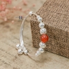vong-tay-tre-em-charm-cau-bac-va-da-do-co-chuong-v2409110025