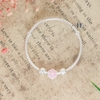 vong-tay-tre-em-hoa-tiet-gan-charm-hoa-6-canh-hong-v2409110011