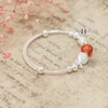 vong-tay-tre-em-charm-ca-va-cau-bac-ket-hop-charm-cau-do-v2409110020