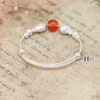 vong-tay-tre-em-charm-ca-va-cau-bac-ket-hop-charm-cau-do-v2409110020