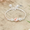 vong-tay-tre-em-charm-cau-bac-va-da-co-chuong-v2409110022