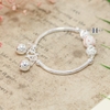 vong-tay-tre-em-charm-cau-bac-va-da-co-chuong-v2409110022