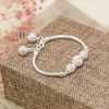 vong-tay-tre-em-charm-cau-bac-va-da-co-chuong-v2409110022