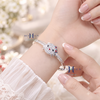 vong-tay-bac-mat-vong-hinh-hello-kitty-dinh-da-trang-deo-no-do