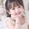 vong-tay-be-gai-charm-hoa-4-canh-hong-ket-hop-charm-xoan-oc-2-ben-v2409110028
