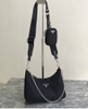 Túi Prada multi pochette 2in1