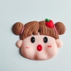 Tượng nhựa dẻo-BABY mập tóc cài trái dâu tây.