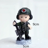 Tượng sứ - em bé bộ đội (dựng súng).