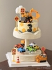 Bàn xoay cupcake trụ giữa có nhạc (2 tầng).
