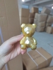 Gấu nhựa ngồi size to  - màu vàng.