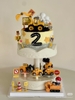 Bàn xoay cupcake trụ giữa có nhạc (2 tầng).