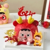 Tượng nhựa em bé rồng vàng-tay chạm má.