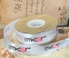 Ruybang vải kt 2.5cmx 35m - chữ LOVE you dọc có trái tim hồng-nền TRẮNG.