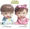 Tượng bé gái cài nơ hồng ôm bình sữa-NHỰA MỀM.