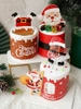 Set 10 thành bánh giấy chủ đề NOEL 10cmx55cm - họa tiết bức tường đỏ và sticker giấy ông già noel leo thang.
