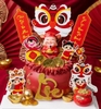 Combo 2 Set giấy TẾT- (em bé múa lân và câu đối).