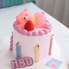 Tượng gấu hồng dáng nằm (có đèn).