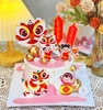 Combo 2 Set giấy TẾT- (em bé múa lân và câu đối).