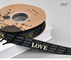 Ruybang vải kt 2.5cmx 35m - chữ LOVE vàng nhũ -nền ĐEN.