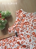 Đùi sát nách nẹp bèo cotton, cam hoa