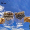 dan-kalimba-17-phim-chinh-hang-kimi-trong-suot-tang-day-du-phu-kien