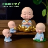 CT2496_Chú tiểu áo xanh