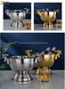Bâu inox ướp lạnh chai bia rượu vang tại bàn có chân đế