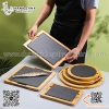 Đĩa đá đen kèm đế gỗ hình chữ nhật trưng bày steak, thịt bò, sushi đồ ăn hoặc hoa quả các loại
