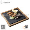 Khay đá đen kèm đế gỗ hình vuông trưng bày đồ ăn, beef steak, sushi các loại