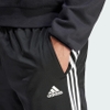 quan-adidas-nam-chinh-hang-essentials-3-stripes-tapered-boot-track-pants-den-jap