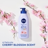 SỮA DƯỠNG THỂ HƯƠNG HOA ANH ĐÀO VÀ DẦU JOJOBA - NIVEA OIL INFUSED BODY LOTION WITH CHERRY BLOSSOM AND JOJOBA OIL - 16.9 FL OZ