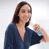 Combo bàn chải điện và tăm nước Oral-B 2-in-1 Professional Dental Care Kit