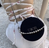 Túi gift tròn DIOR xanh có gương (đã mix dây)